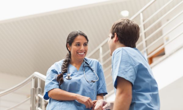 mp3598112-nurses-talking-on-stairs