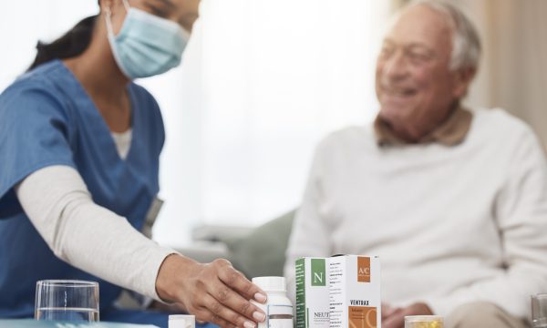 mp64950773-patient-nurse-and-medication-with-checkup-at-home-with