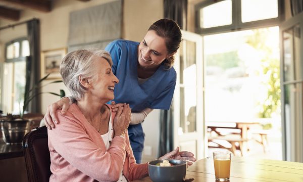 mp65753305-food-helping-and-nurse-with-senior-woman-in-assisted